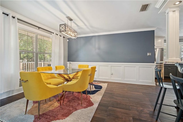 4072 Fenwick Loop, Mobile, AL 36619 - dining room with ornamental molding, a wainscoted wall, dark wood-type flooring, and a decorative wall