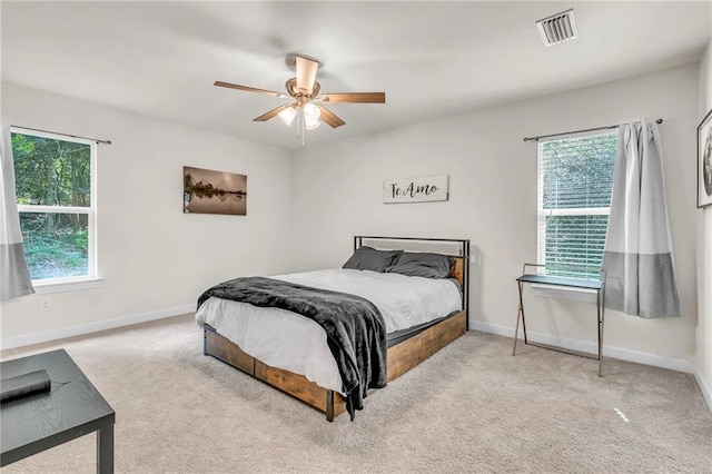 1933 Wildwood Pl, Mobile, AL 36609 - bedroom featuring baseboards, a ceiling fan, carpet floors, and visible vents
