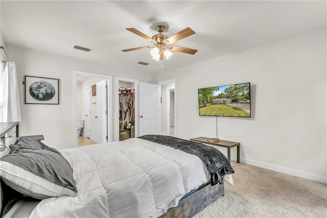 1933 Wildwood Pl, Mobile, AL 36609 - carpeted bedroom featuring visible vents, a closet, baseboards, a spacious closet, and a ceiling fan