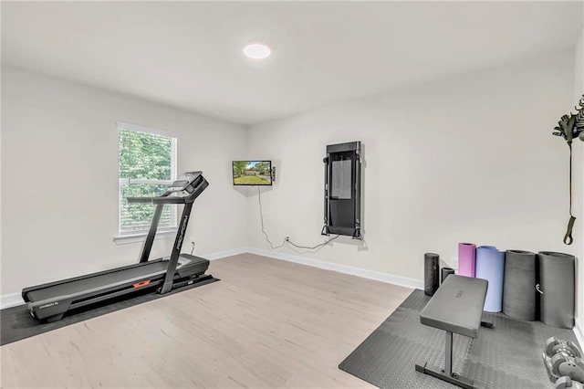 1933 Wildwood Pl, Mobile, AL 36609 - exercise area featuring baseboards and wood finished floors