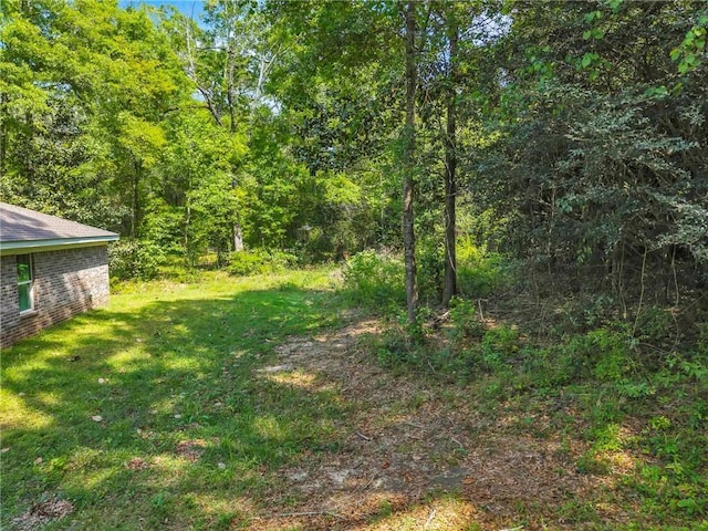 1933 Wildwood Pl, Mobile, AL 36609 - view of yard with a view of trees