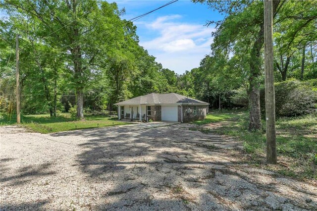 1933 Wildwood Pl, Mobile, AL 36609 - exterior space featuring a garage and driveway