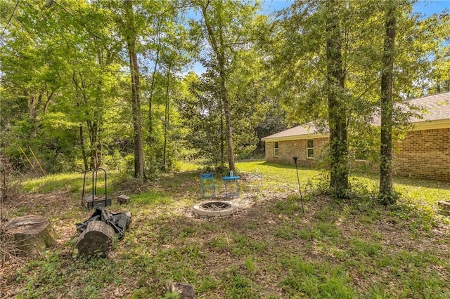 1933 Wildwood Pl, Mobile, AL 36609 - view of yard featuring a fire pit