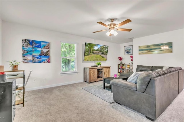 1933 Wildwood Pl, Mobile, AL 36609 - carpeted living room featuring baseboards and a ceiling fan