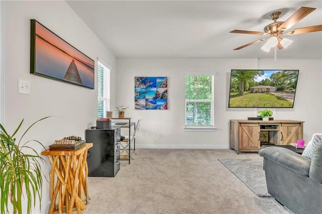 1933 Wildwood Pl, Mobile, AL 36609 - carpeted living room with baseboards and a ceiling fan