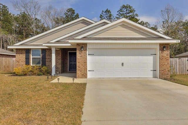 single story home with an attached garage, brick siding, fence, concrete driveway, and a front yard