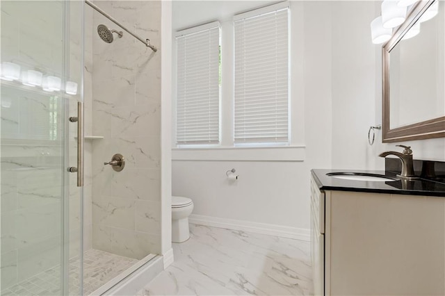 bathroom featuring a shower with door, tile patterned floors, toilet, and vanity