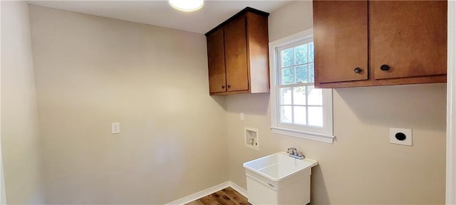 laundry area featuring cabinets, hookup for a washing machine, electric dryer hookup, and a healthy amount of sunlight