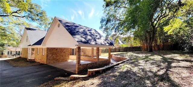 view of home's exterior with a patio