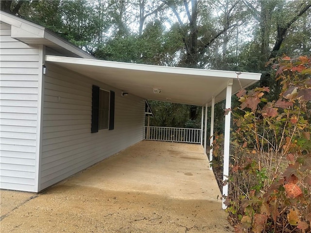 view of car parking featuring a carport