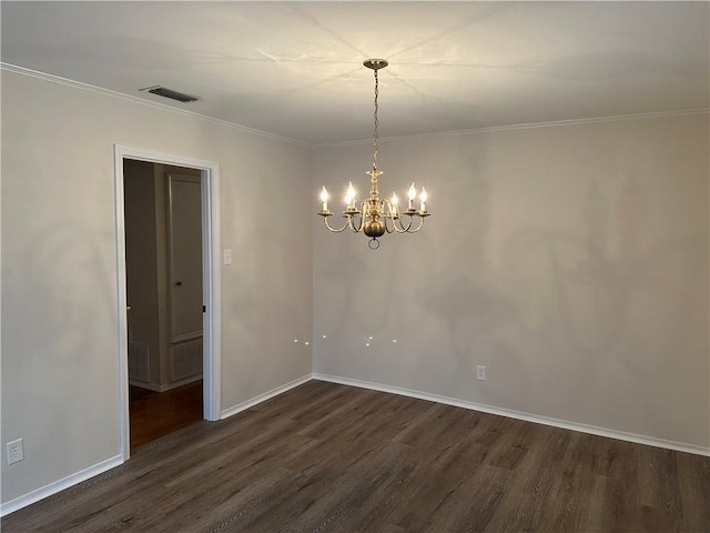 unfurnished room featuring a chandelier, dark hardwood / wood-style floors, and crown molding