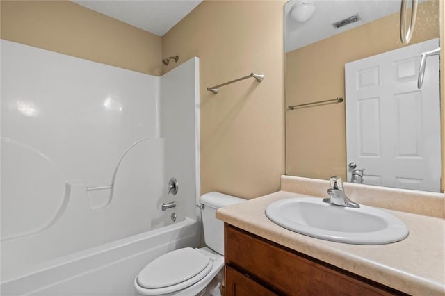 full bathroom featuring vanity,  shower combination, and toilet