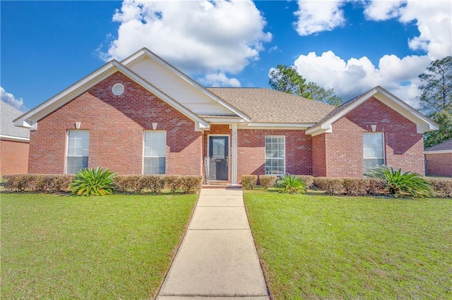 view of front facade with a front yard