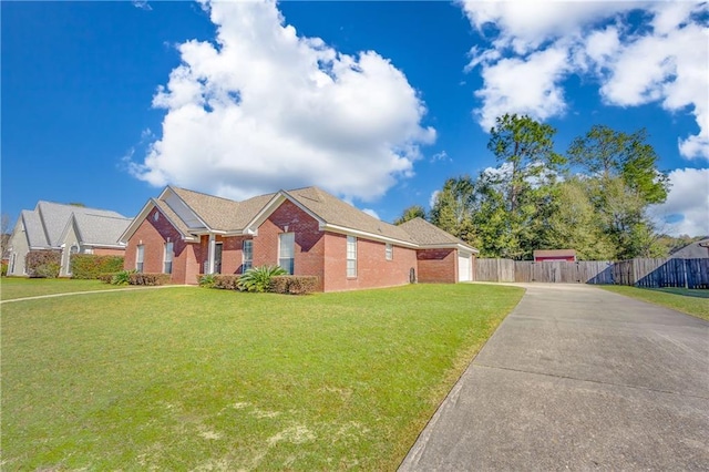 single story home with a front yard