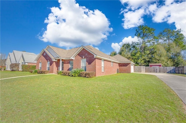 single story home with a front yard