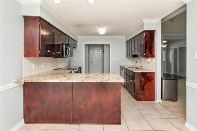 kitchen with ornamental molding, a sink, a peninsula, and decorative backsplash