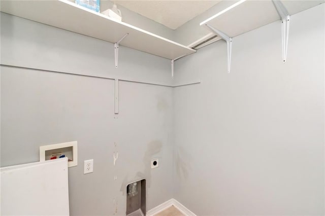 laundry room with laundry area, hookup for a washing machine, and hookup for an electric dryer