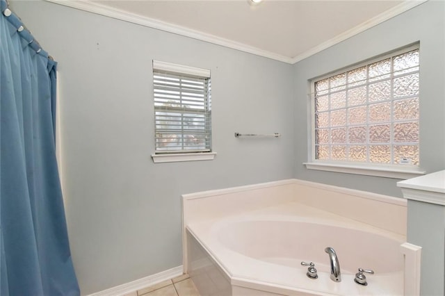 full bath featuring ornamental molding, tile patterned floors, baseboards, and a bath