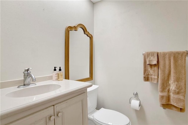 half bath with toilet and vanity