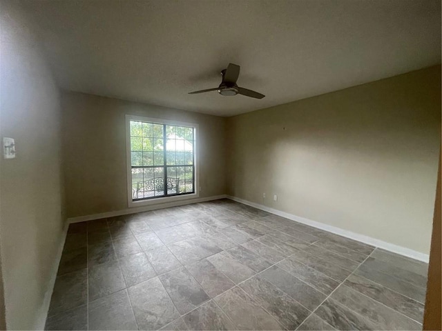 spare room featuring ceiling fan