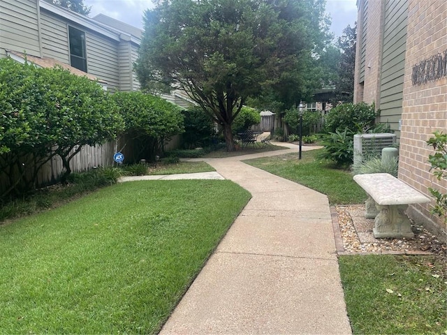 2901 Grant St Unit 2703, Mobile, AL 36606 - view of yard featuring a fenced backyard and central AC