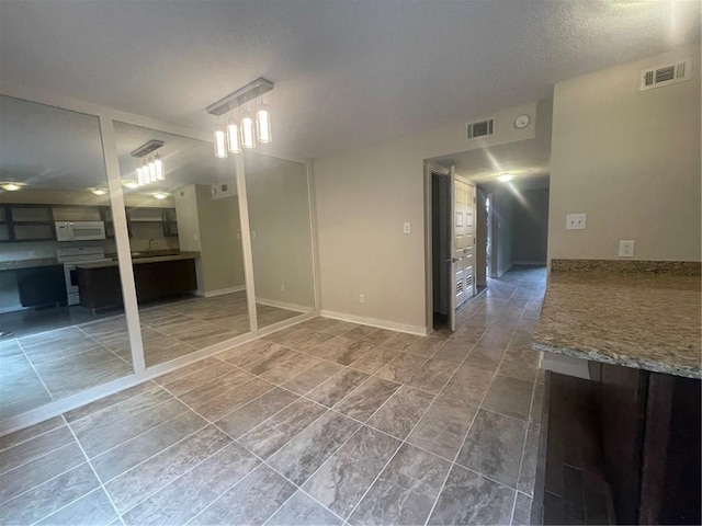 basement with a textured ceiling