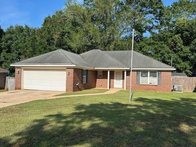 6611 Morgan Jackson Ct, Mobile, AL 36582 - ranch-style home with an attached garage, cooling unit, driveway, and brick siding