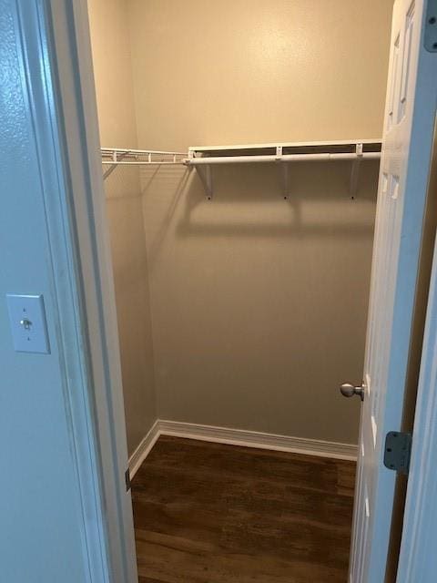 6611 Morgan Jackson Ct, Mobile, AL 36582 - spacious closet with dark wood-style flooring
