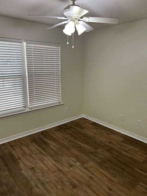 6611 Morgan Jackson Ct, Mobile, AL 36582 - unfurnished room featuring dark wood-style floors, baseboards, and ceiling fan