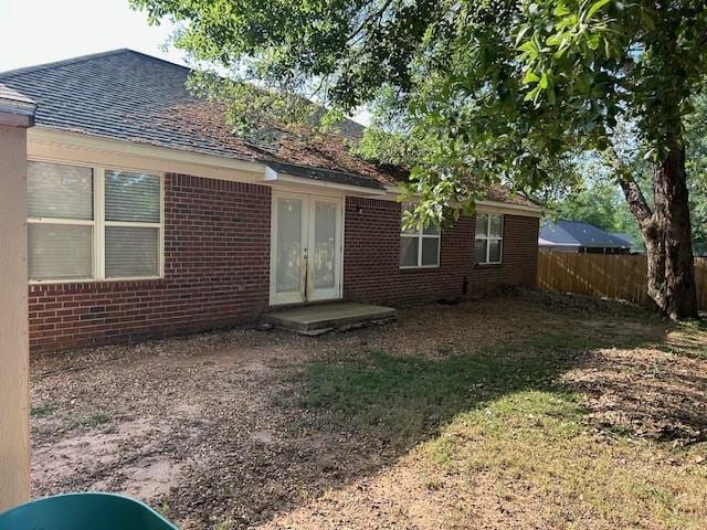 6611 Morgan Jackson Ct, Mobile, AL 36582 - rear view of property with brick siding, french doors, and a shingled roof