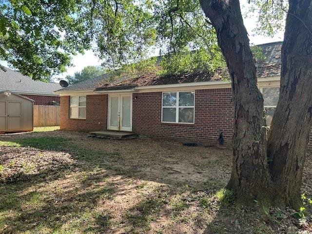 6611 Morgan Jackson Ct, Mobile, AL 36582 - rear view of house featuring brick siding and french doors