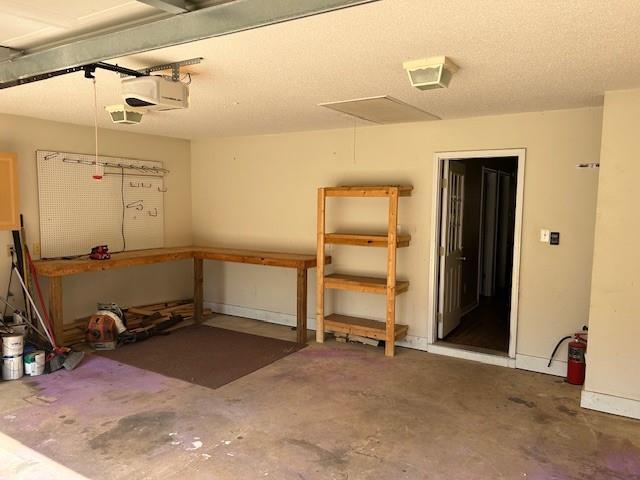 6611 Morgan Jackson Ct, Mobile, AL 36582 - garage featuring a garage door opener