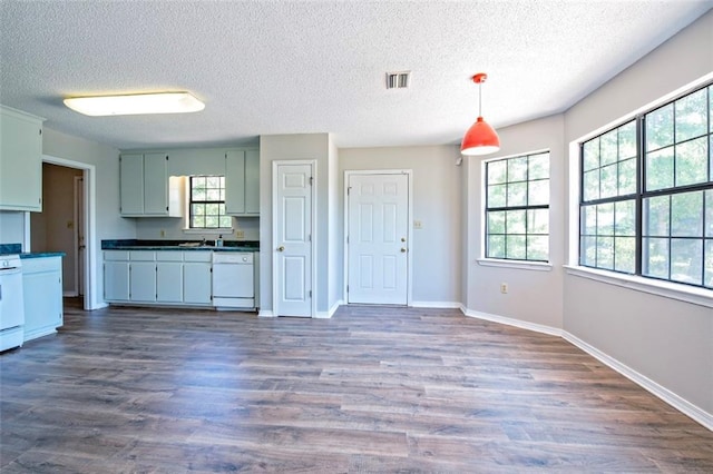 17180 Jim Platt Rd, Citronelle, AL 36522 - kitchen featuring dishwasher, dark countertops, plenty of natural light, a textured ceiling, and range