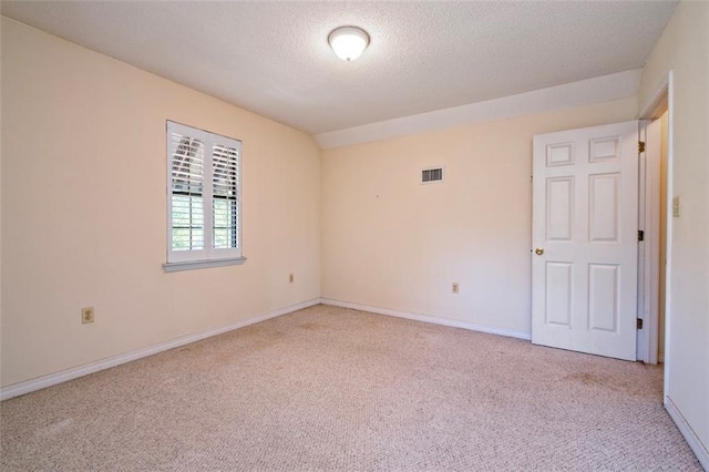 17180 Jim Platt Rd, Citronelle, AL 36522 - unfurnished room with light colored carpet, baseboards, and a textured ceiling