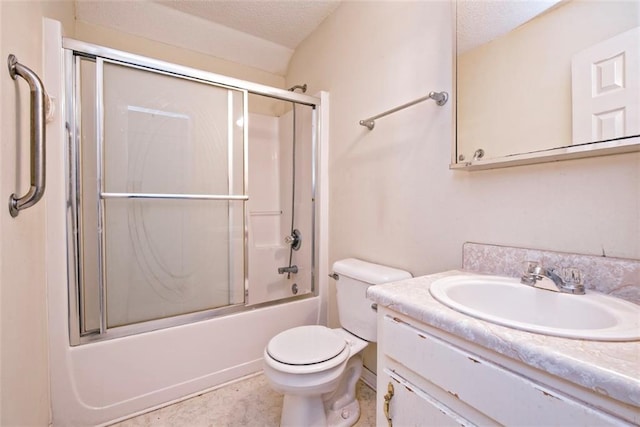 17180 Jim Platt Rd, Citronelle, AL 36522 - full bath with vanity, combined bath / shower with glass door, toilet, and a textured ceiling