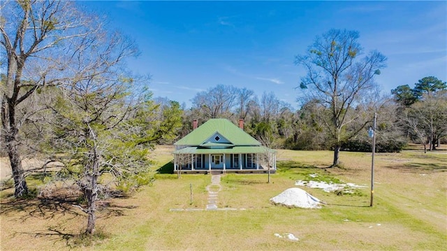 52780 State Highway 59, Stockton, AL 36579 - rear view of property featuring a lawn and covered porch