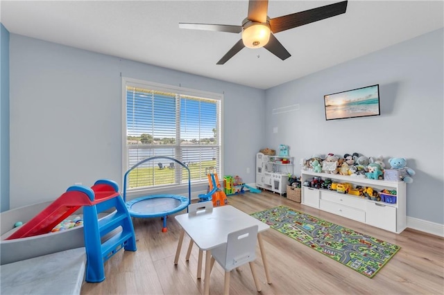25504 Sunrise Ct, Loxley, AL 36551 - recreation room featuring wood finished floors, ceiling fan, and baseboards