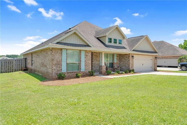 25504 Sunrise Ct, Loxley, AL 36551 - view of front facade featuring brick siding, concrete driveway, a garage, covered porch, and board and batten siding