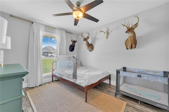 25504 Sunrise Ct, Loxley, AL 36551 - bedroom featuring wood finished floors, baseboards, and ceiling fan