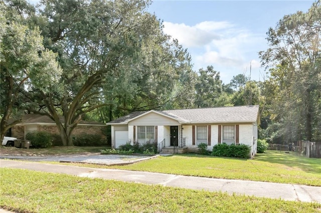 ranch-style home featuring a front lawn