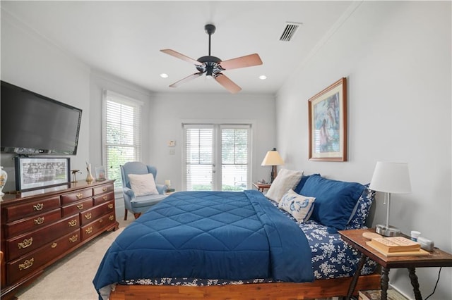 3009 Riverside Dr, Mobile, AL 36605 - bedroom with ornamental molding, light colored carpet, and a ceiling fan