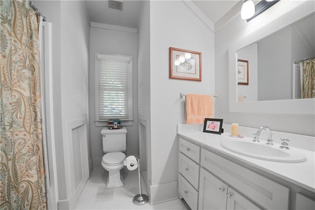 3009 Riverside Dr, Mobile, AL 36605 - full bathroom featuring vanity, tile patterned flooring, and a shower with shower curtain
