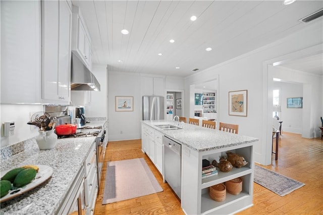 3009 Riverside Dr, Mobile, AL 36605 - kitchen featuring stainless steel appliances, open shelves, recessed lighting, under cabinet range hood, and white cabinetry