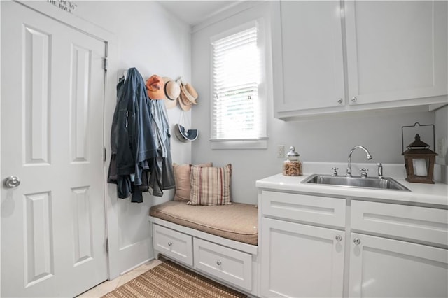 3009 Riverside Dr, Mobile, AL 36605 - mudroom with a sink and light tile patterned floors