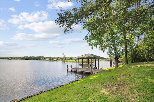 3009 Riverside Dr, Mobile, AL 36605 - dock featuring a yard, a water view, and boat lift