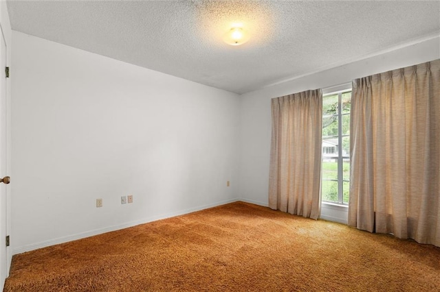 3163 Morgan Rd, Mobile, AL 36605 - carpeted empty room with a textured ceiling and baseboards