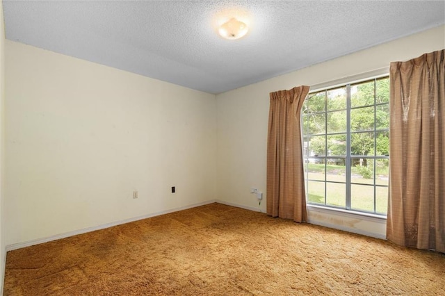 3163 Morgan Rd, Mobile, AL 36605 - carpeted spare room with a textured ceiling and baseboards