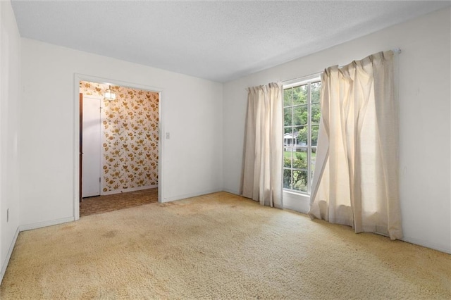 3163 Morgan Rd, Mobile, AL 36605 - unfurnished room featuring carpet flooring and a textured ceiling