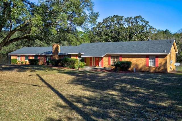 single story home with a front yard