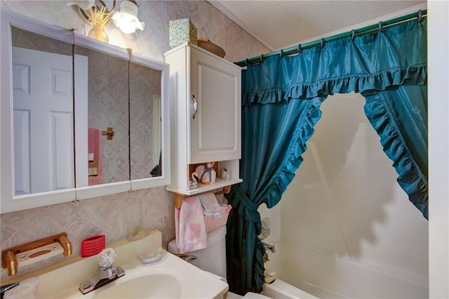 full bathroom featuring vanity, shower / tub combo, and toilet